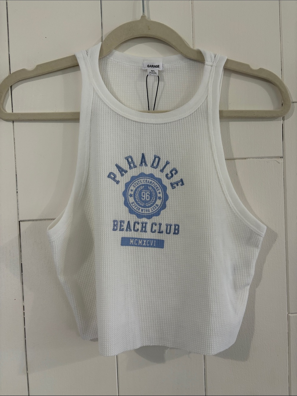 Garage White Tank with Light Blue Paradise Beach Club Logo